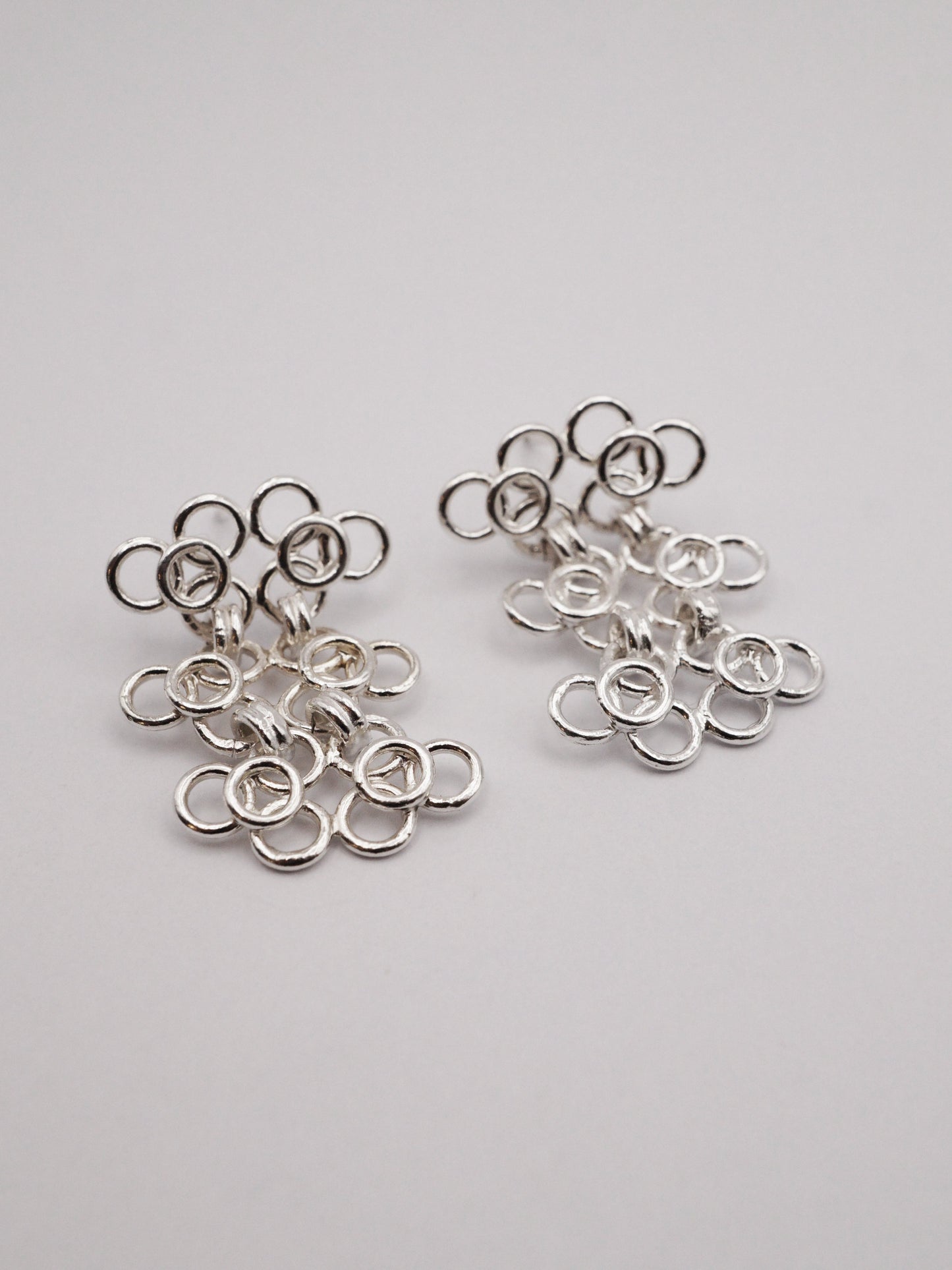 sterling silver TRAME I and TRAME II earrings