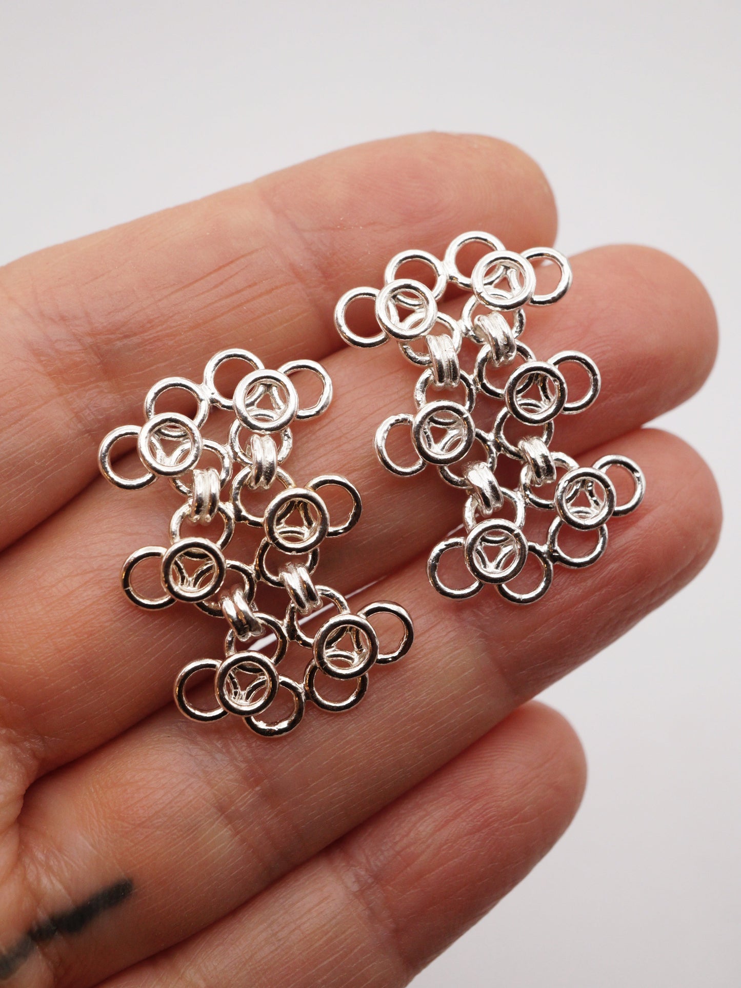 sterling silver TRAME I and TRAME II earrings