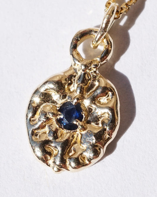 Pendentif TALISMAN - petit rond - Saphir bleu et or 10 carats